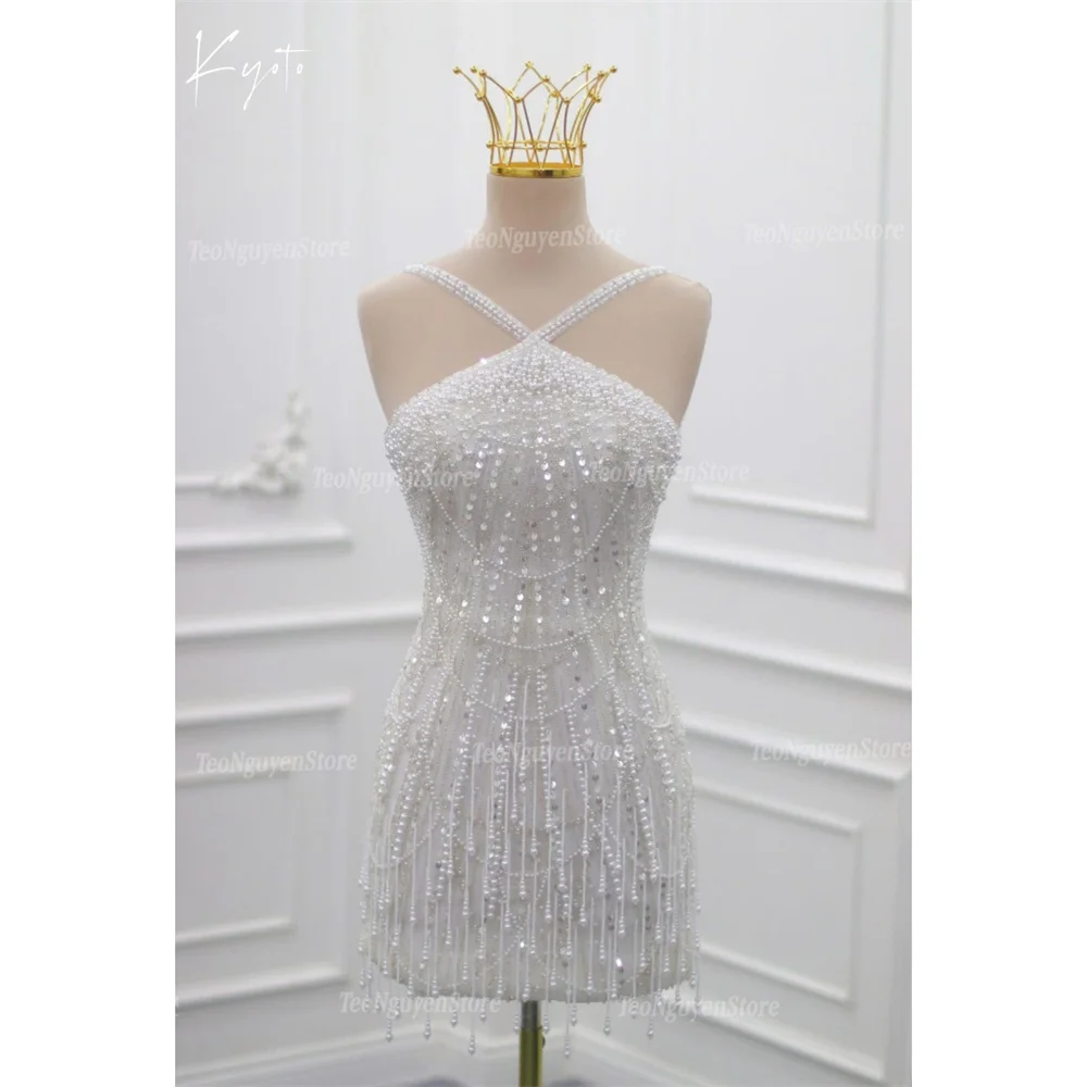 فستان زفاف كيوتو مخصص لامع مطرز بالخرز غمد صغير رقبة رسن بدون أكمام فستان سهرة أبيض فاخر 2025