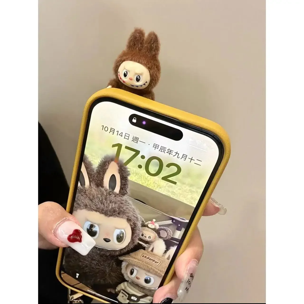 

The cartoon leather labubu phone case with lanyard is suitable for iPhone16 15 14 13 pro max Y2k