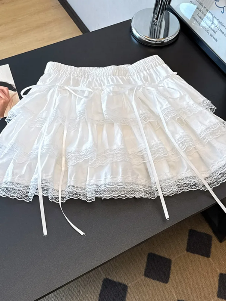 白いふわふわケーキショートスカート女性の夏の新しい韓国バレエスタイルユニークなデザインアンチエイジングレーストリムスカート
