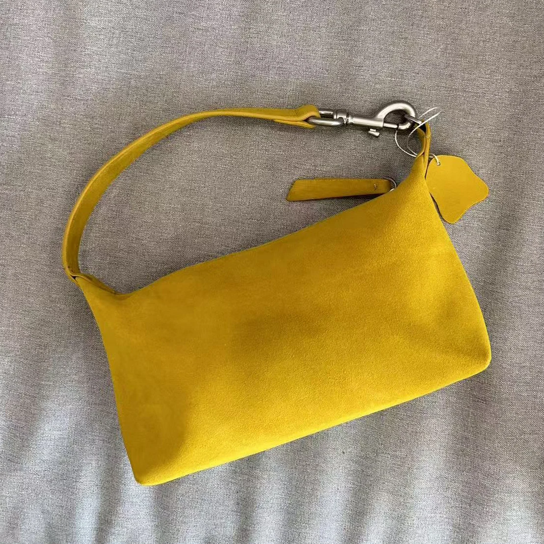 

Sheepskin suede handbag 2025 new niche design genuine leather fashion crossbody bag high quality women's armpit shoulder bag