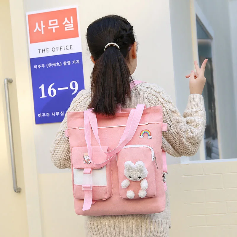 New Children's Canvas Bag Korean Fashion Primary School Handbag Large Capacity Cartoon Waterproof Portable Bag High end Design