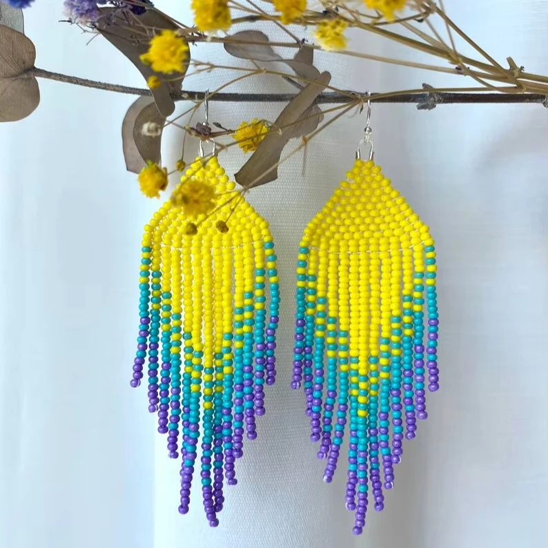 

Rice bead earrings Tassels Gradient color Bohemia Alloy Fashion Creativity Geometry Female Simple Beaded earrings