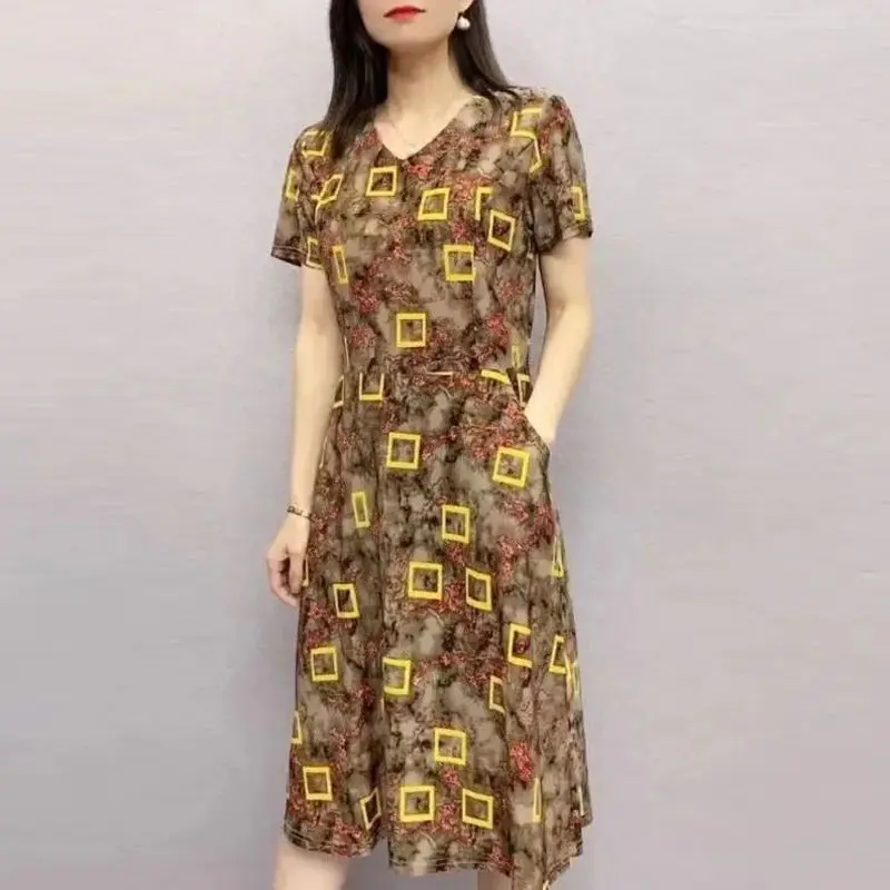 

2024 Summer New Fashion Printing V-Neck Pockets Elegant Versatile Simplicity Commute Women's Short Sleeve Casual Dresses