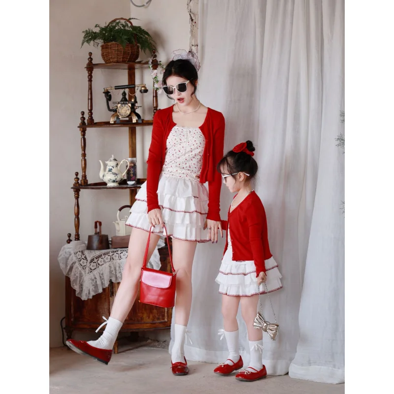 

Parent-Child Outfit25Spring New Parent-Child Knitted Cotton Cardigan Suit Floral Strap Bubble Dress Three-Piece Set