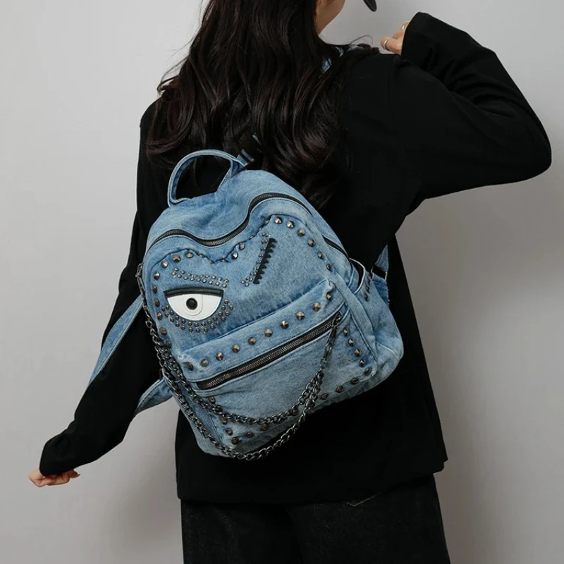 mochila-feminina-vintage-de-jeans-com-corrente-decorativa-de-olhos-punk-e-tachas-goticas-grande-capacidade-casual-para-viagem-2026