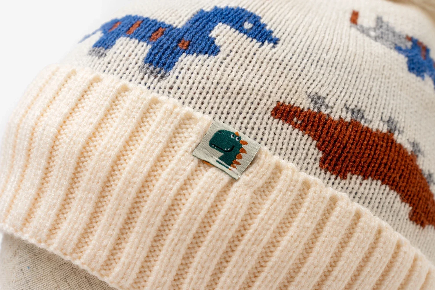 مجموعة من قطعتين لخريف وشتاء الأطفال من 3 إلى 12 سنة - وشاح قبعة محبوك دافئ لحماية الأذن على شكل ديناصور صغير