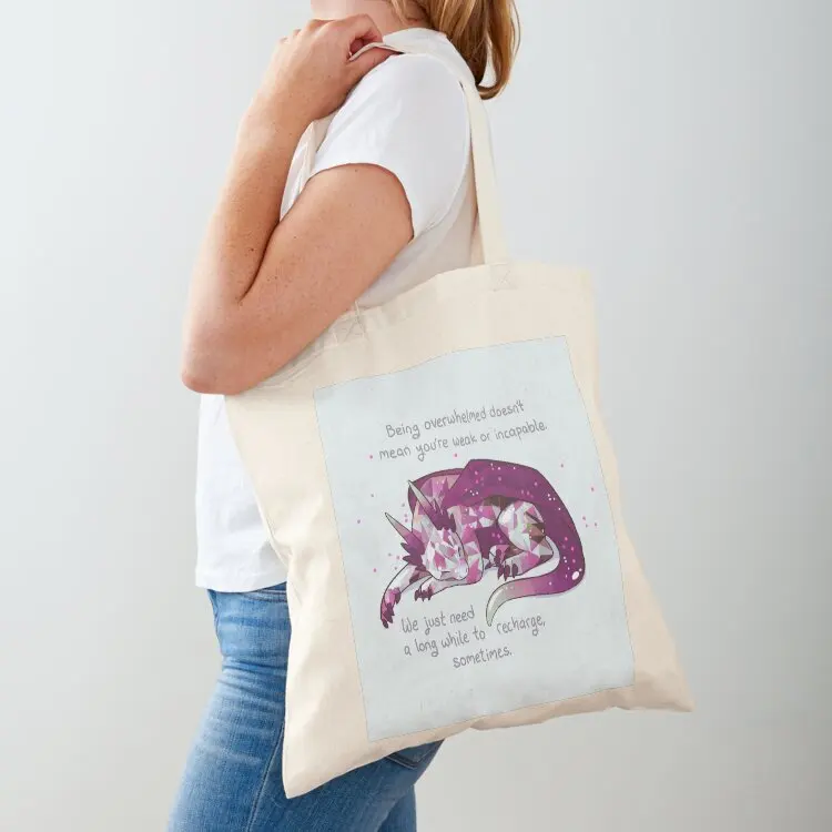 

Being overwhelmed doesn't mean you're weak or incapable Gemstone Dragon Tote Bag