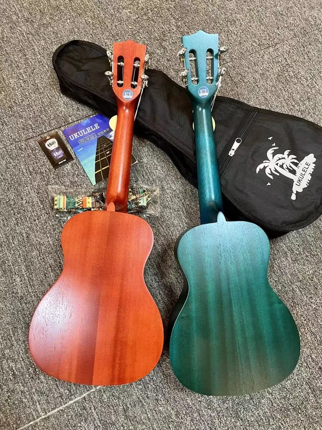 23 Inch Ukulele Ukulele, Veneer Single Full Peach Blossom Core Veneer Rounded Corners By Hand Ukulele
