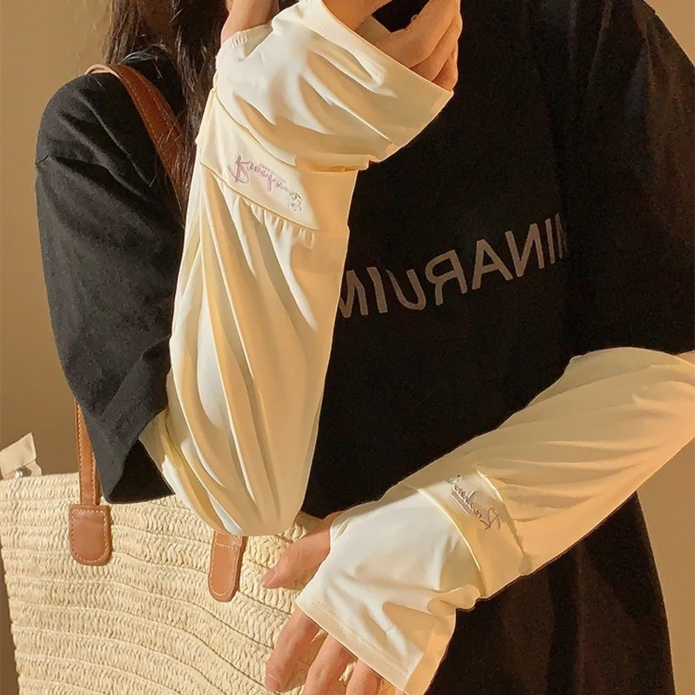 ดอกไม้ปักยาวผ้าไหมน้ําแข็งแขนหลวมยืดหยุ่นครีมกันแดดแขนครอบคลุมแขนป้องกันบางถุงมือขี่จักรยานขับรถ