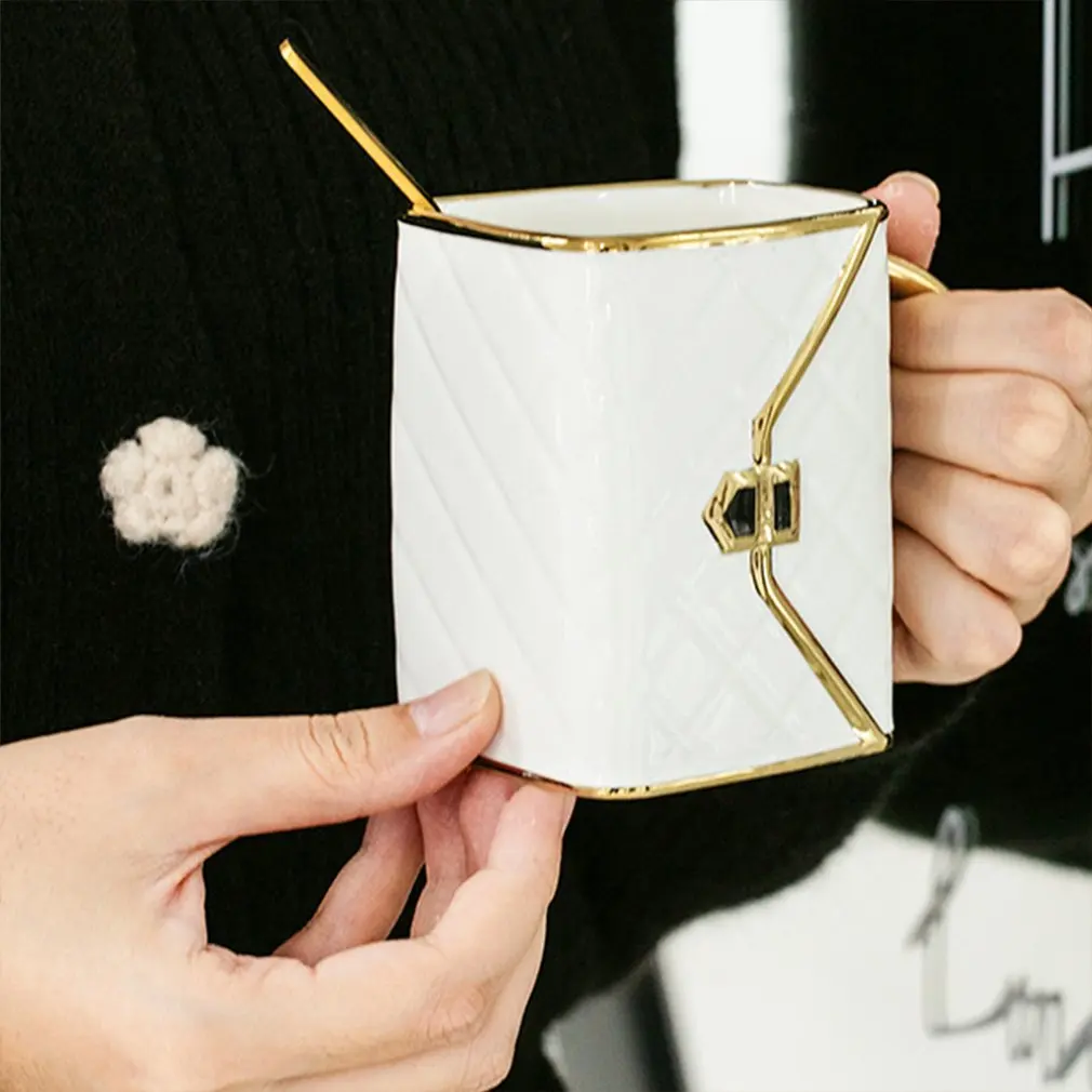 High-value Depiction Of Gold Coffee Cups And Saucers Set Creative Bag Shape Snacks Ceramic Business Gifts Activities