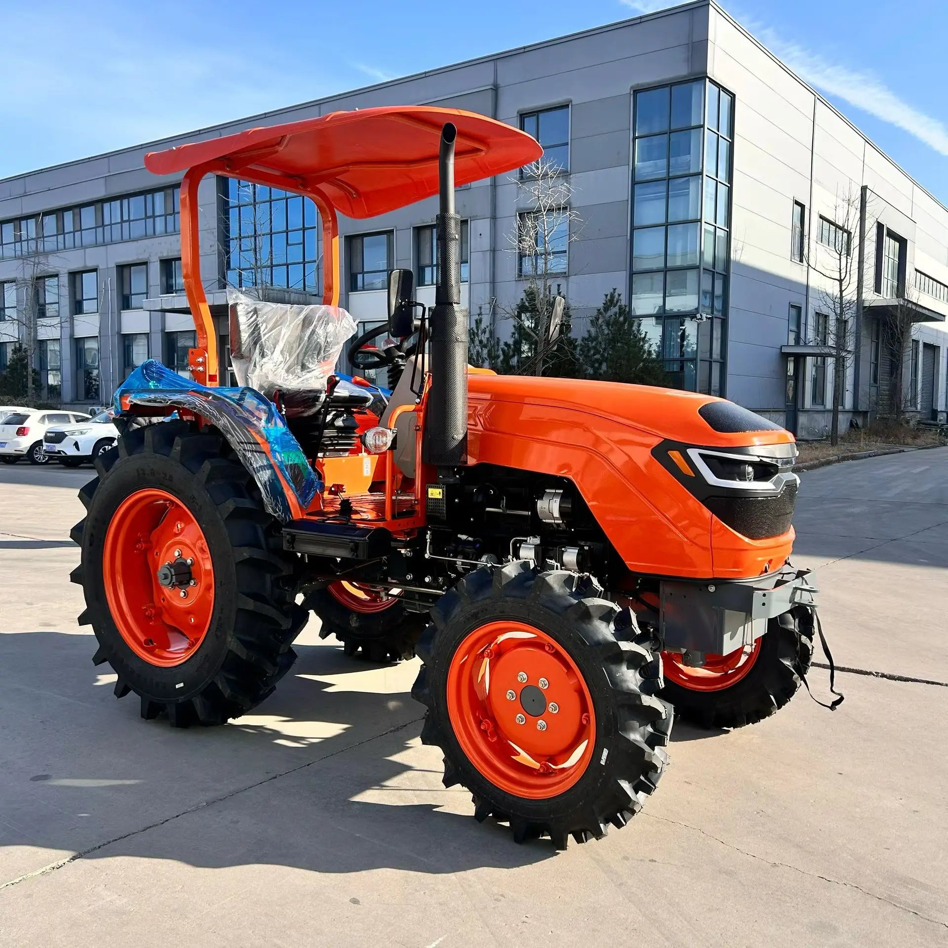 For sale: CE COC 4X4 25-150 hp mini agricultural tractor equipped with a bulldozer blade and loading blade; roadworthy.