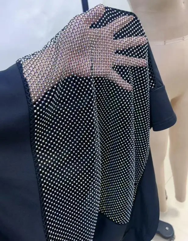 Camiseta feminina 2026 primavera moda nova sexy rede de pesca perspectiva oco design solto cor sólida camiseta adequada para festas