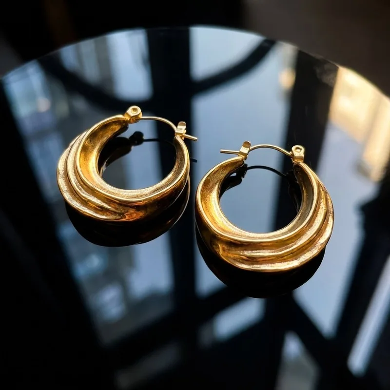 CarlidanaEuropean and American style titanium steel double-layer pleated crescent earrings with vintage texture and curved desig