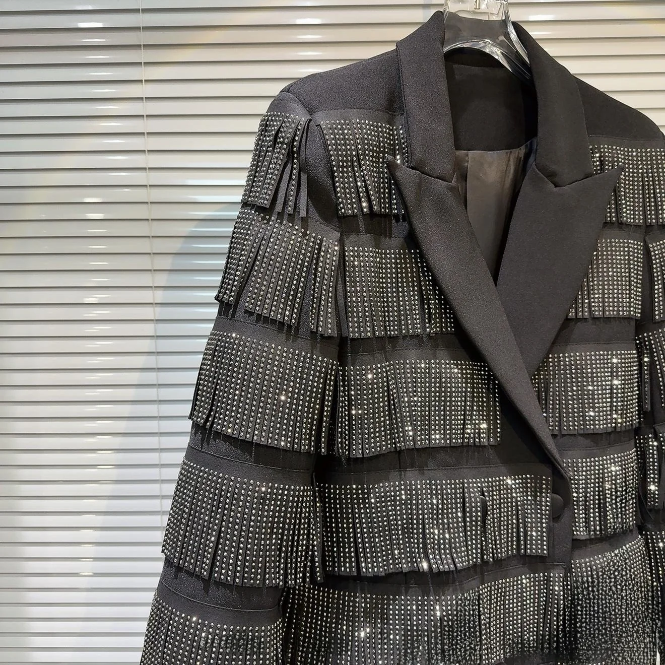 Primavera 2026 novo design pesado oulder pad lantejoulas borla terno feminino design original solto ajuste longo sve um botão cor pura