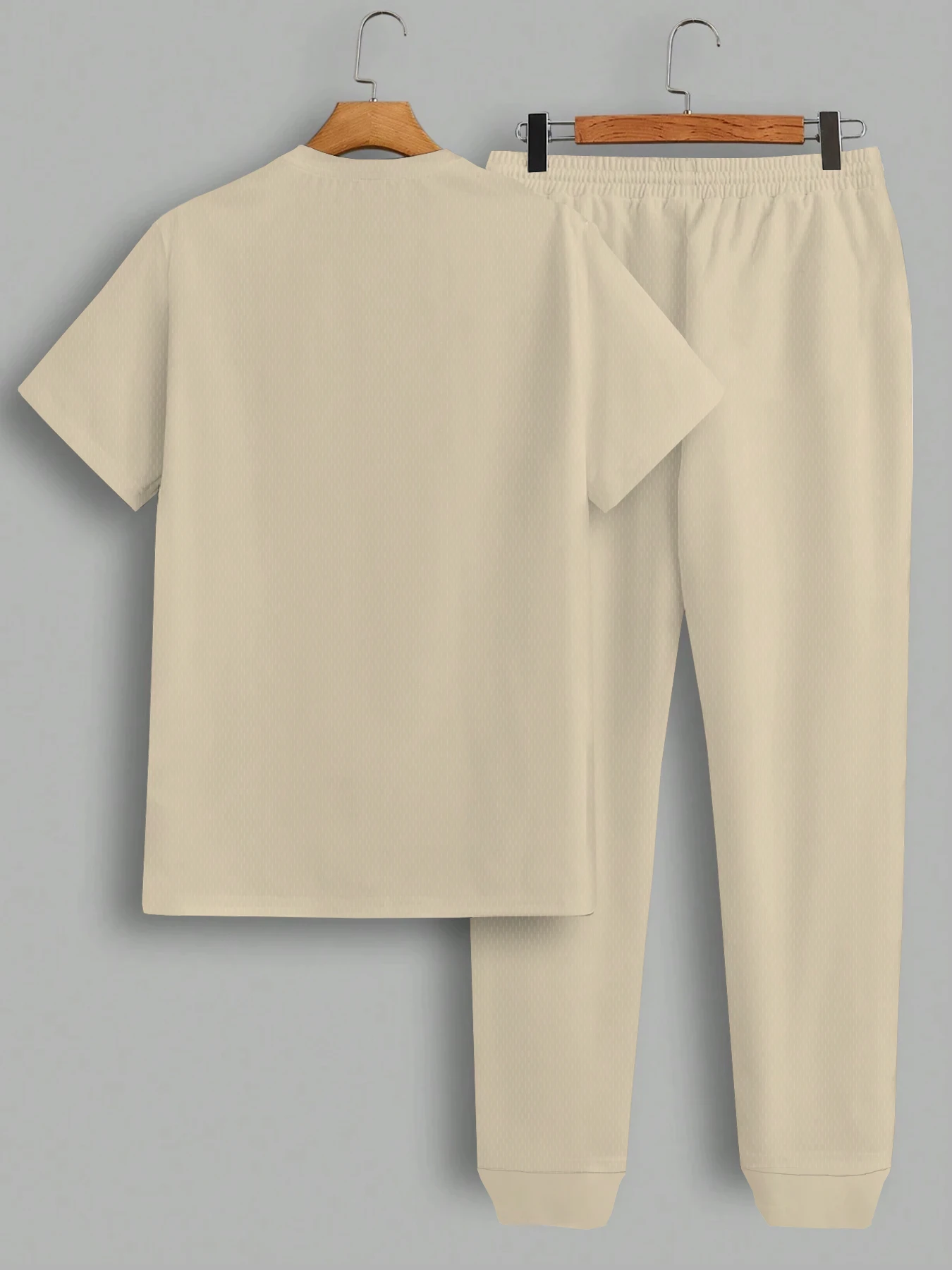 夏の新作メンズレタープリント快適通気性ラウンドネックTシャツマイクロ弾性パンツセットアウトドアカジュアルウェア