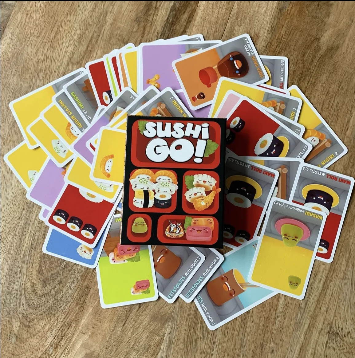 

Sushi Go Board Game - Family-Friendly Card Game for Party Game Night & Travel Easy to Learn Fast-Paced Tabletop Game