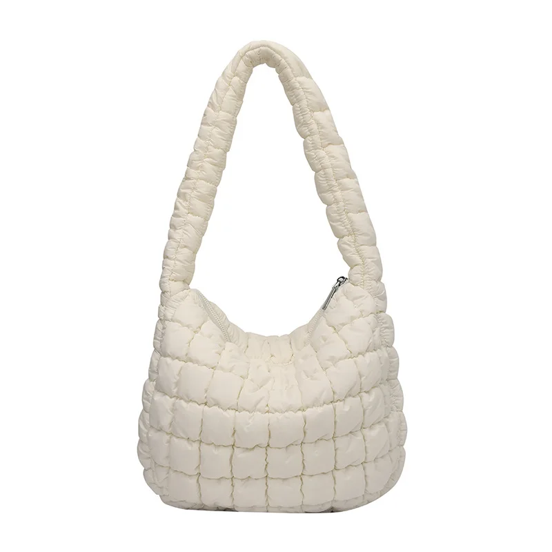 

The Crinkled Cloud It-Bag. Embrace the Korean aesthetic with this stylish, puffy underarm bag. Unique and trendy.