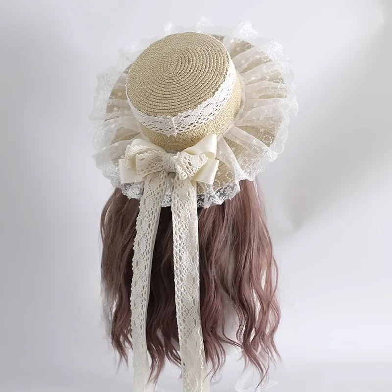 Harajuku النساء البراري شيك القش قبعة الشاطئ قبعة الشمس اليدوية الفتيات الحلو لوليتا نمط تأثيري Kawaii مقوس دانتيل الشريط قبعات من القش