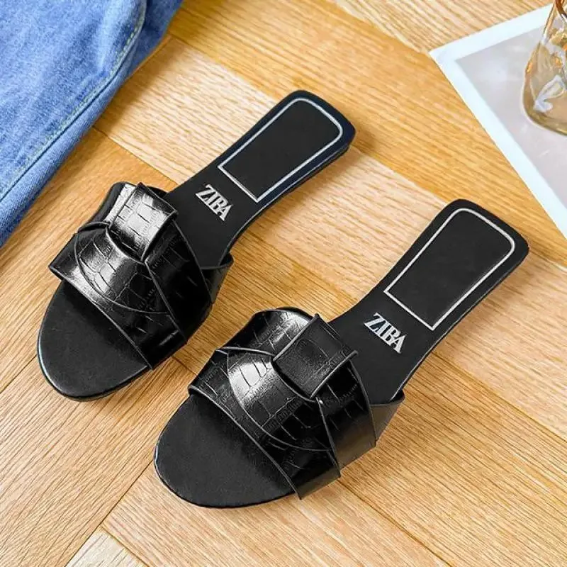 2025 Nuevas sandalias de mujer de diseñador de lujo 2025 Nuevo tejido con cómodas sandalias de mujer Zapatillas planas de verano con parte inferior 