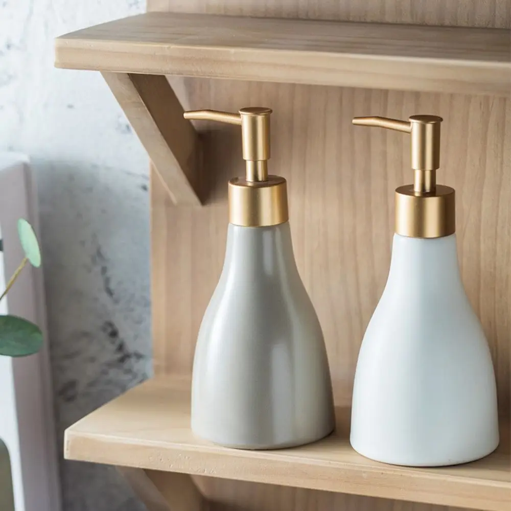 Nuovo sub-imbottigliamento in ceramica tinta unita Testa in metallo Lavaggio a mano da viaggio Bottiglia vuota Bottiglia semplice per lozione shampoo gel doccia