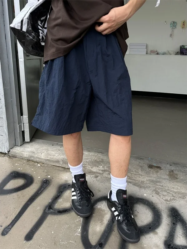 กางเกงลำลองทรงตรงแบบอเมริกันเรโทร ผ้าบาง แห้งเร็ว สีสันสดใส ใส่ได้ทั้งชายและหญิง ทรงหลวม ระบายอากาศดี ขากว้าง ใส่ได้หลายโอกาส ความยาวห้าส่วน