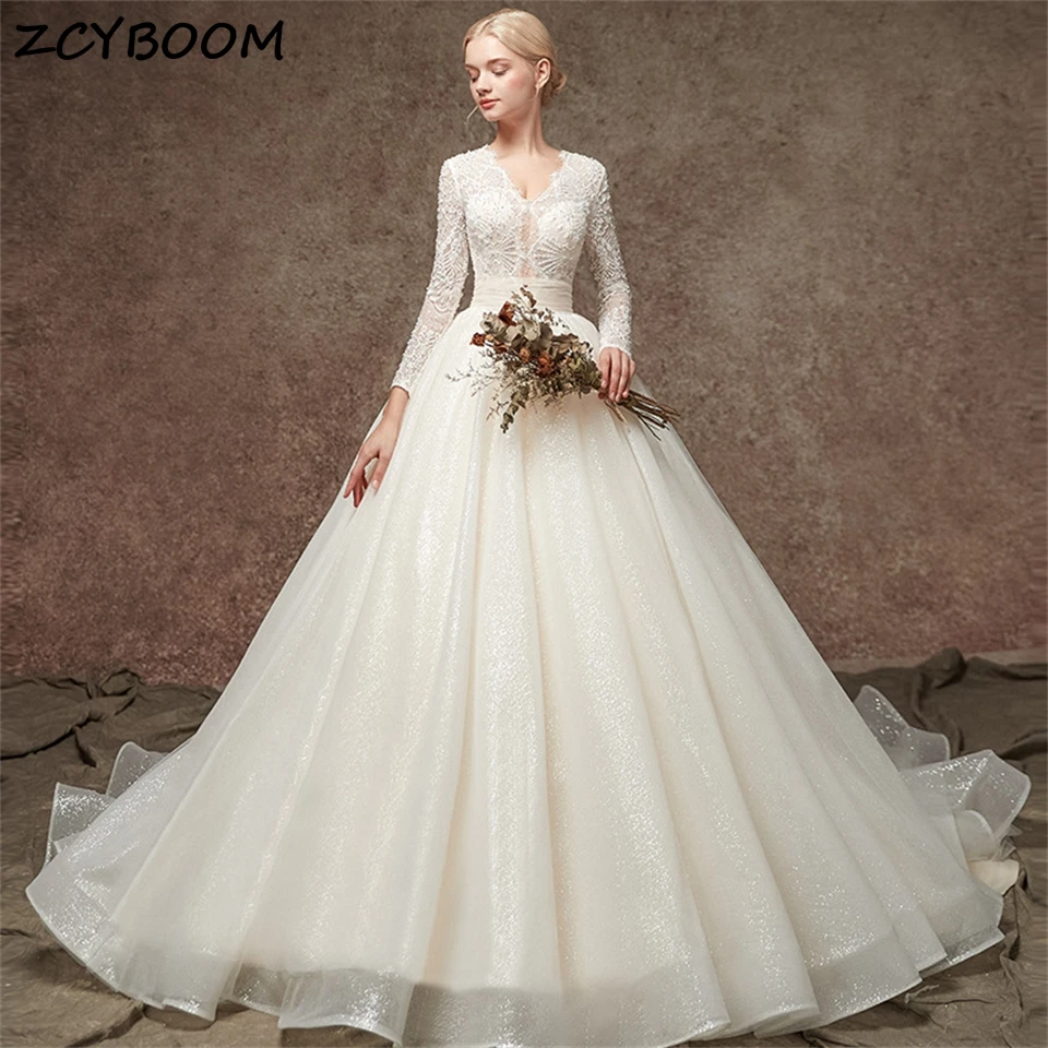 

Customized V-Neck Button Illusion Cut-out Full Sleeves Ball Gown Wedding Dresses For Women 2025 Court Train Vestidos De Noiva