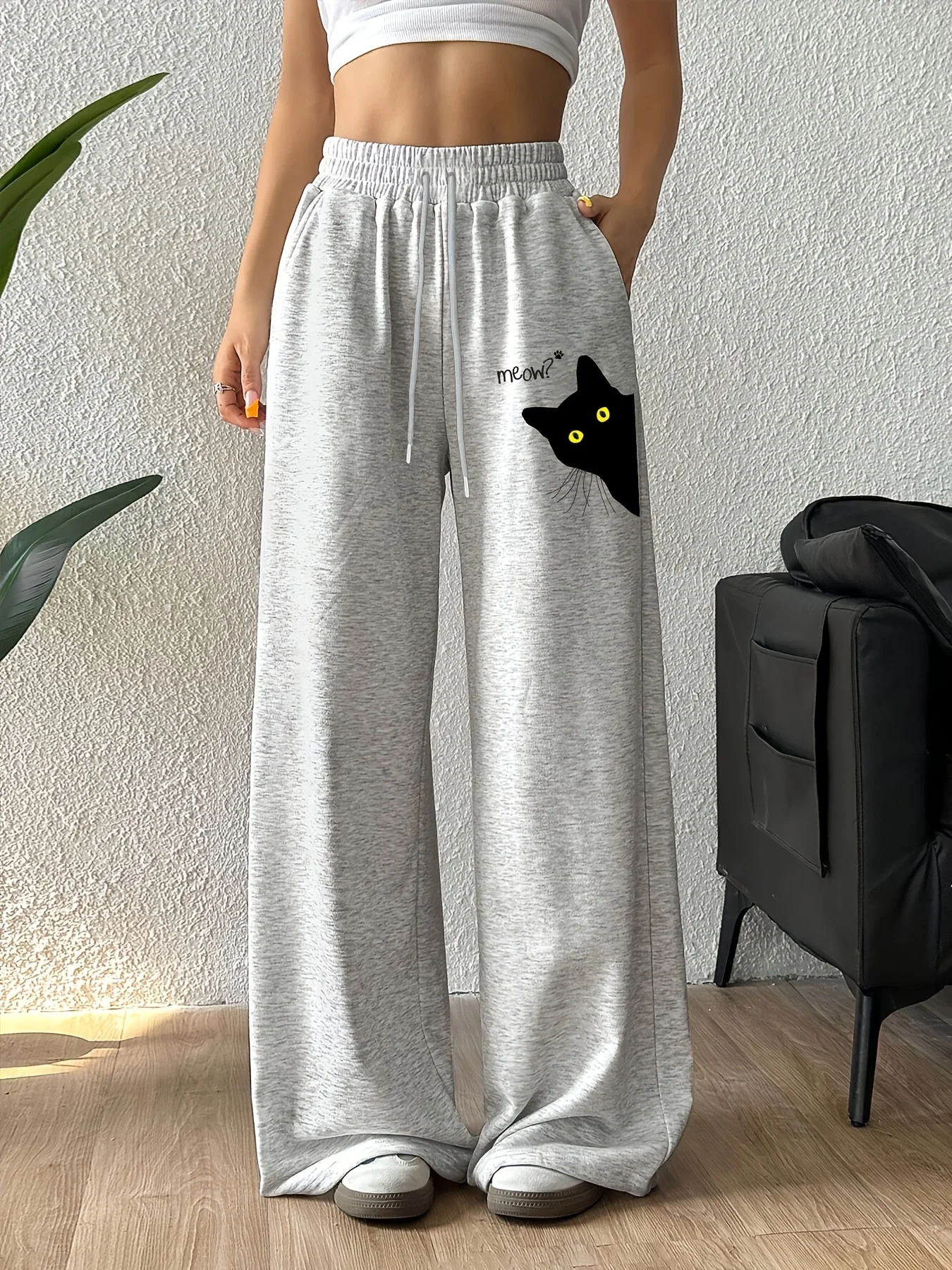 Women's Y2K-style straight-leg pants featuring a playful 