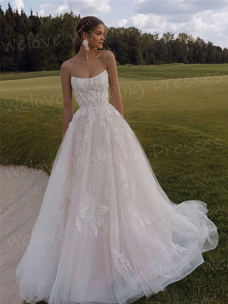 Prachtige A-lijn vrouwen Kant Applicaties Strapless Trouwjurken Robe De Mariée Aangepaste Backless Bruid Toga Vestido De Novia