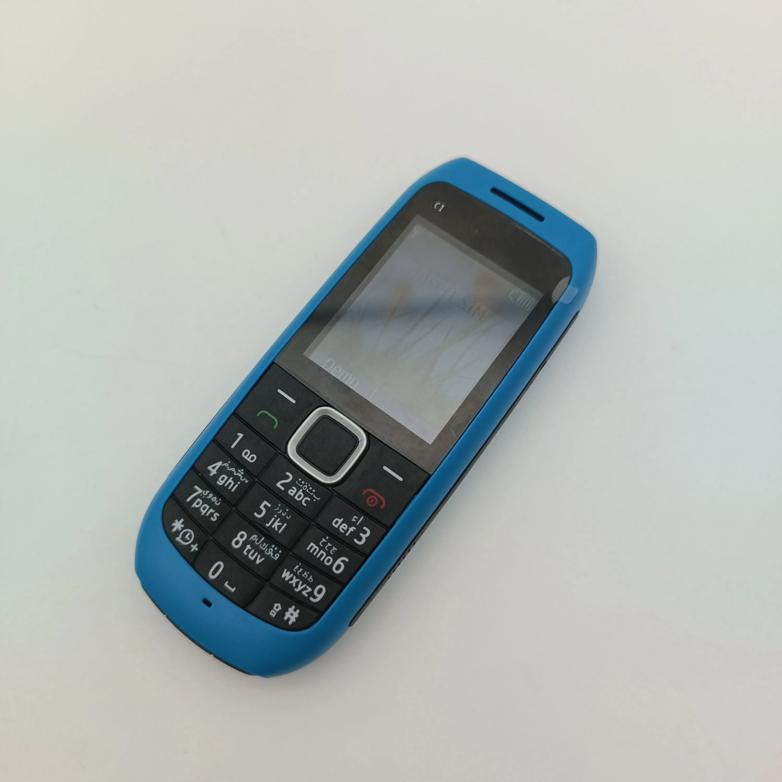 الأصلي مقفلة C1-00 واحد سيم GSM 900/1800 2G الهاتف المحمول لوحة المفاتيح العربية الروسية المصنوعة في فنلندا