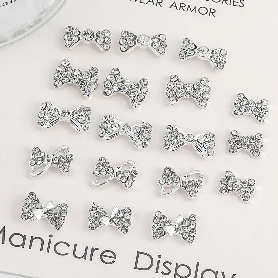 SANANIE 10PCS Shiny White Rhinestone Bow Nail Art Charms 3D Classic Sliver Alloy Butterfly Nails Decoration Manicure Supplies 6