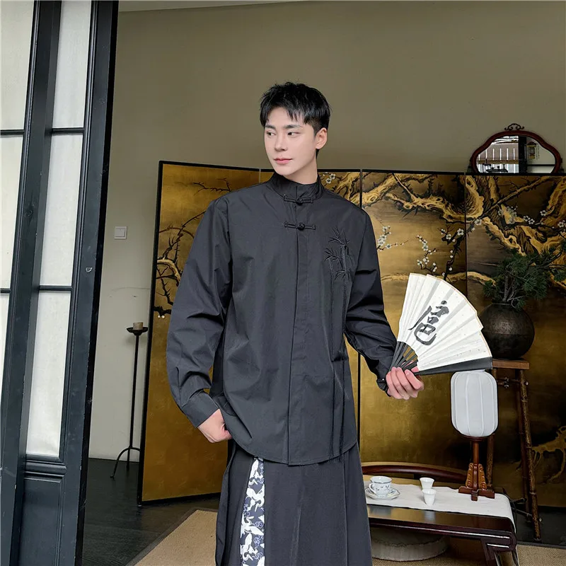 

Новая китайская мужская рубашка с вышивкой в ретро-стиле, с воротником-стойкой, длинными рукавами, модная, премиум-класса, на пуговицах.