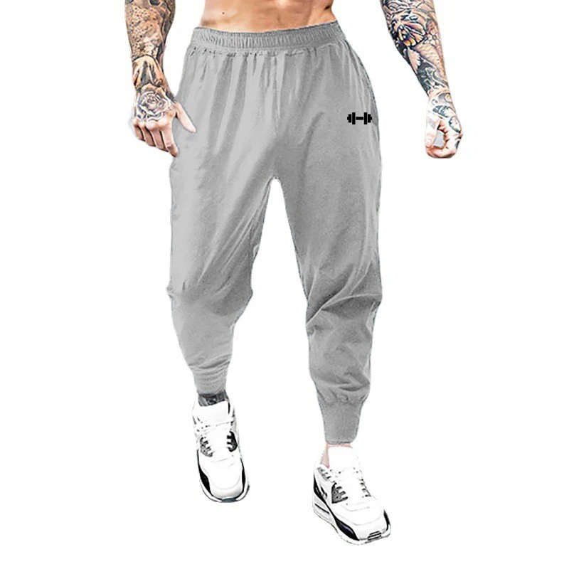 Palestra Bodybuilding Fitness pantaloni sportivi da uomo pantaloni da allenamento Casual vita elastica pantaloni lunghi larghi a vita alta ultrasottili ad asciugatura rapida