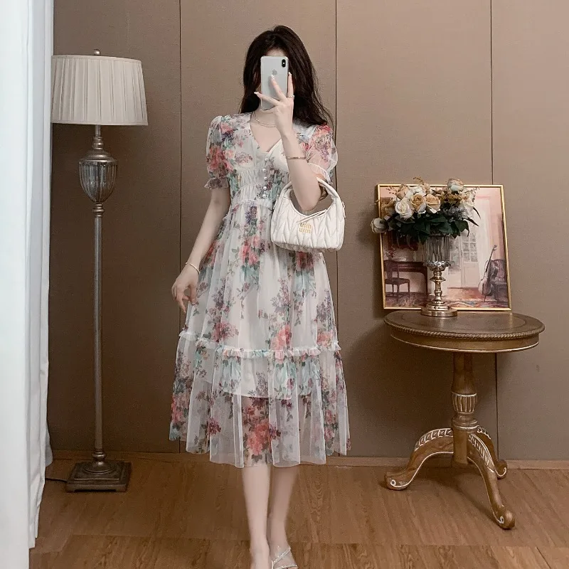 Robe de luxe en gaze imprimée pour femmes, tenue amincissante, mi-longue, tempérament, été, 2025