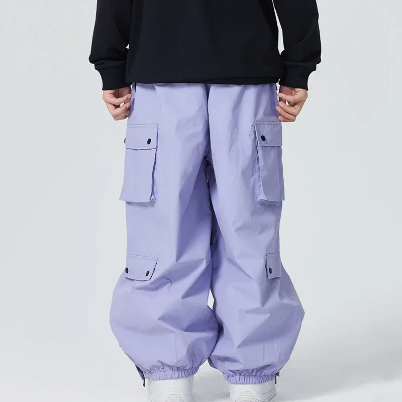 Outdoor Sport Snow Pants 2025 New Women Waterproof Ski Overalls Man Loose Skiing Pants Winter Pro Warm Windproof Couple Trousers