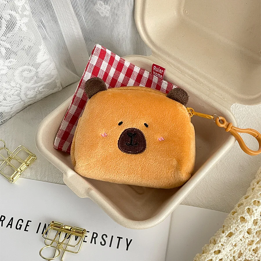 Nouveau créatif Capybara Anime en peluche porte-monnaie belle bande dessinée Capybara en peluche portefeuille fille casque sac de rangement enfants cadeau
