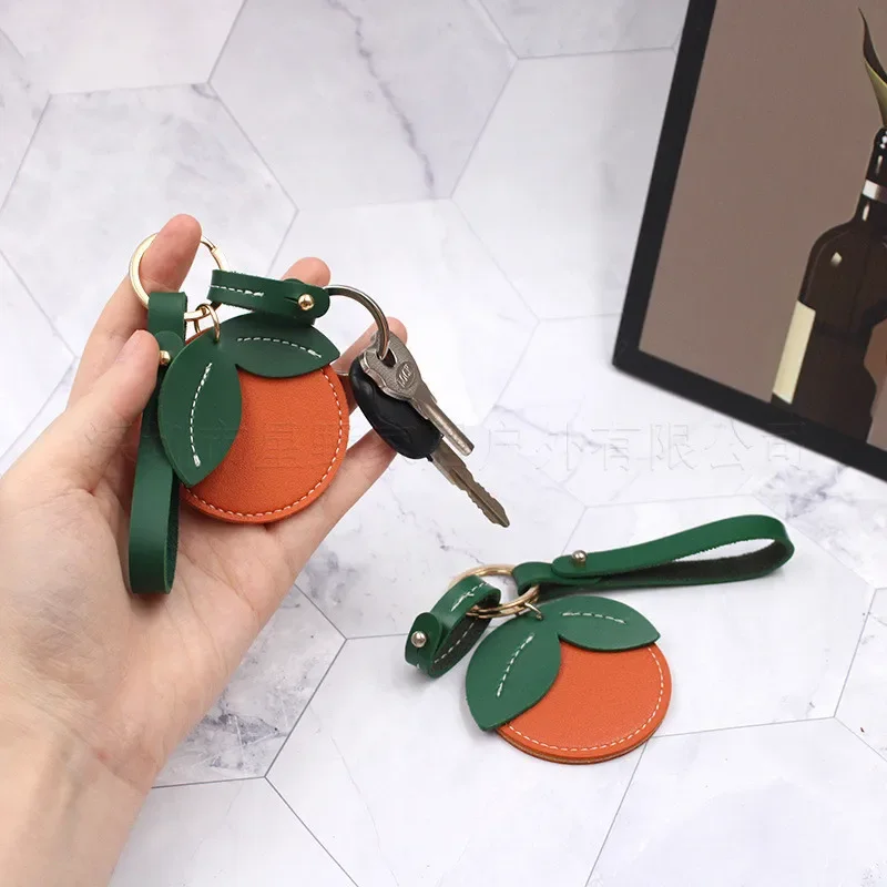 Leather Keychain Holder Case, Cute Protective Air Tag Cover with Keychain , Anti-Scratch Finder GPS Tracker Case for Wallet，1pcs