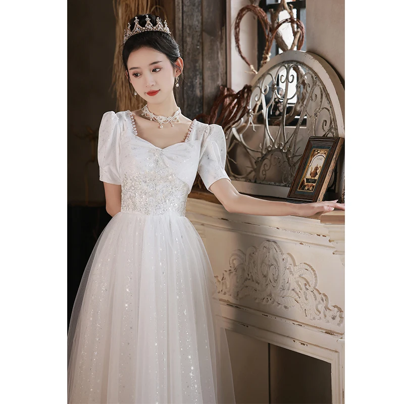 فساتين سهرة بيضاء للنساء أنيقة بياقة مربعة وأكمام منتفخة مزينة بالترتر مطرز بالخرز مأدبة مزاجه فساتين حفلات الزفاف