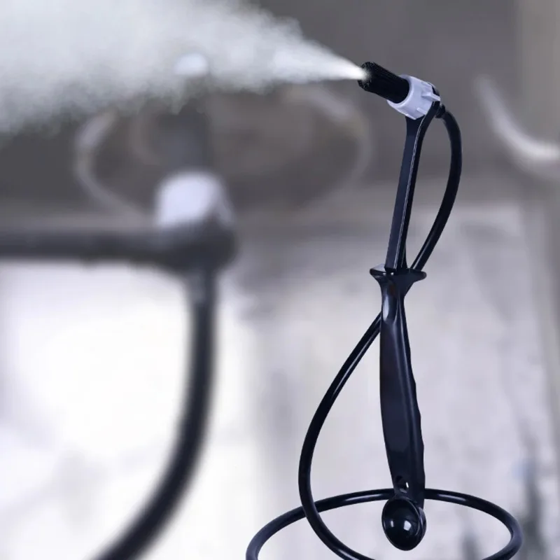 The Barista Uses The Steam Wand of a Heat-Resistant Food-Grade Coffee Machine to Brush The PP Handle