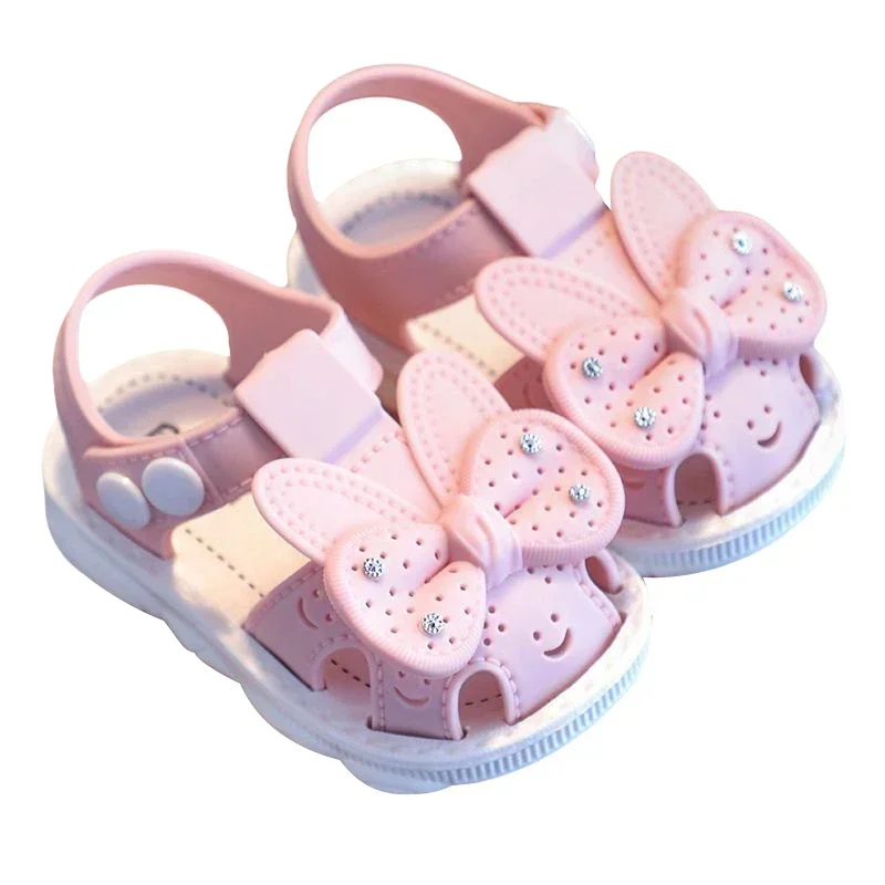 Scarpe estive per bambini con fiocco solido Sandali antiscivolo da spiaggia in PVC carino per neonate Calzature Sandali morbidi per bambini alla moda