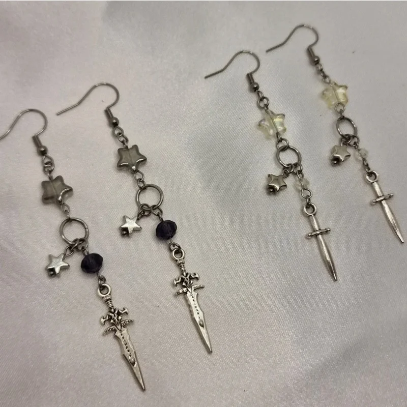 Y2K sword and star earrings, pendants with specific colors. Handmade. Friendship. Aesthetics (almost) anything is possible!