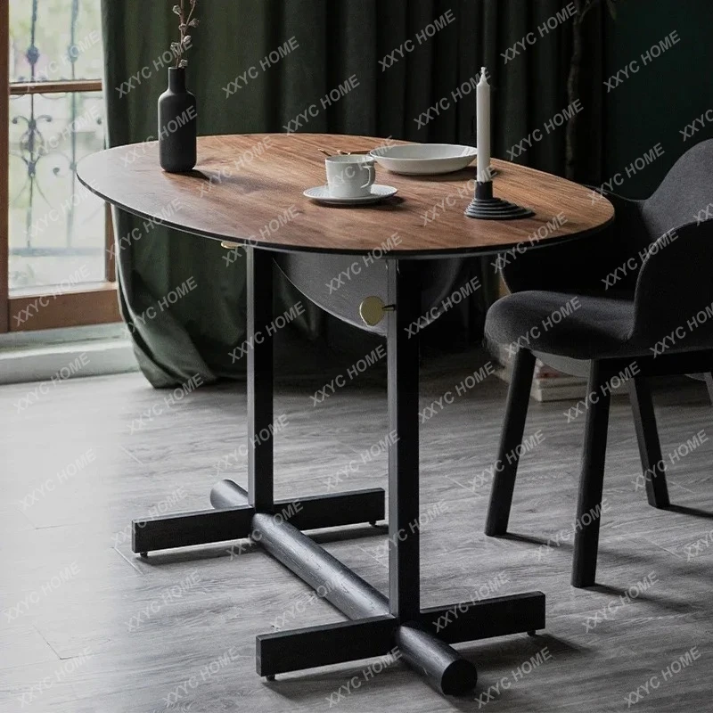Folding dining table solid wood small apartment home modern simple light luxury oval high sense