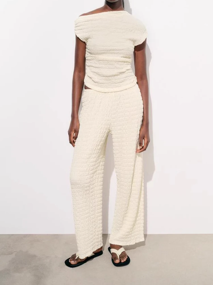 

European and American style Spring new products Women's clothing all-match Textured asymmetrical tops high waist trousers