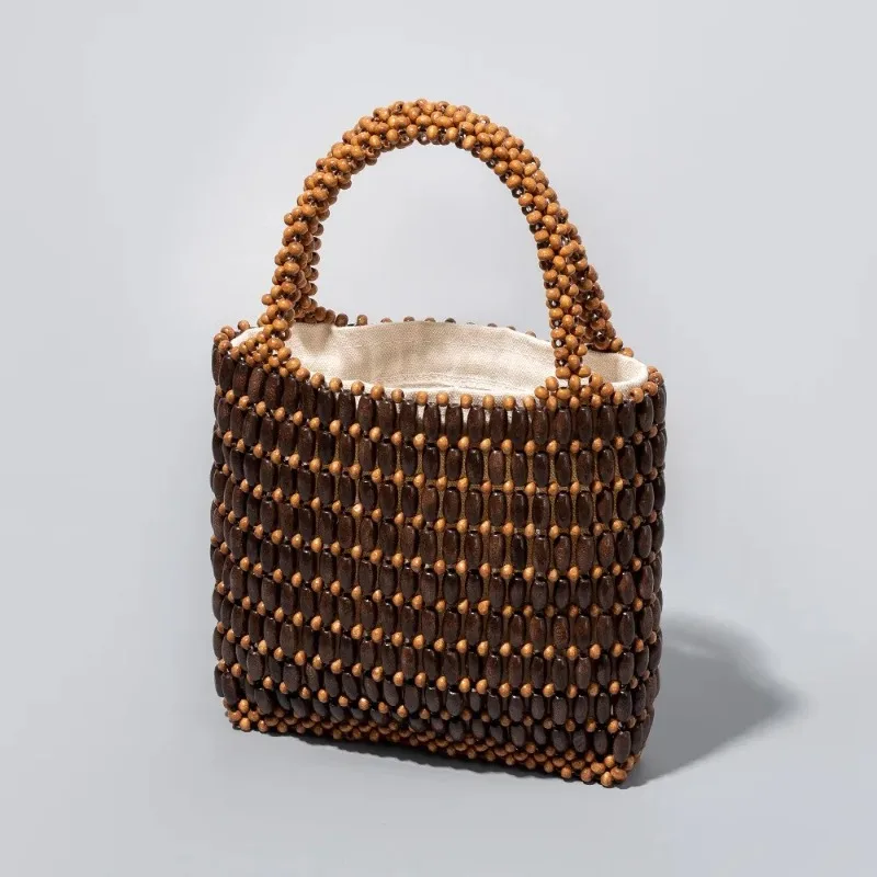 

Handmade Woven Clutch Purses For Women Exquisite Design Hollow-out Wooden Bead Small Handbag With a Removable Inner Bag