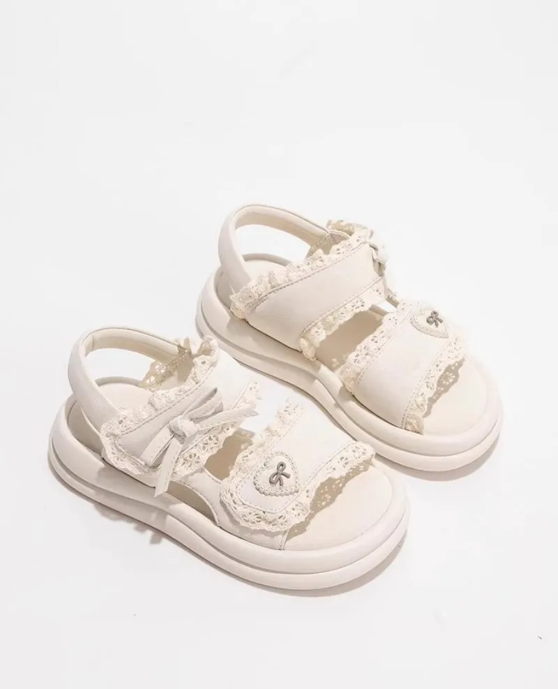 Girls' casual sandals for summer 2026featuring princessstyle design with lace trim and soft bottom for a rural style casual shoe