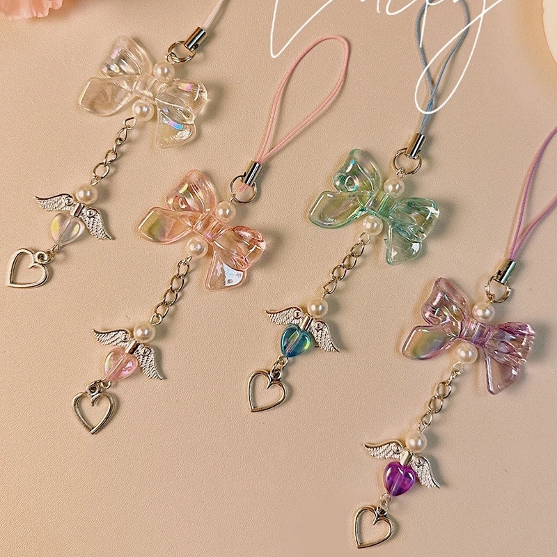 สายโซ่คล้องโทรศัพท์รูปโบว์ Y2k หวานปีกนางฟ้าน่ารักจี้รูปหัวใจเคสสายคล้องคอป้องกันการสูญหาย