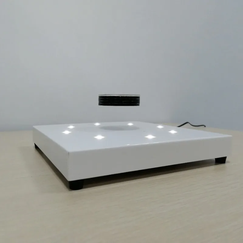 Acrylic magnetic levitation display stand shows promotional products to attract attention