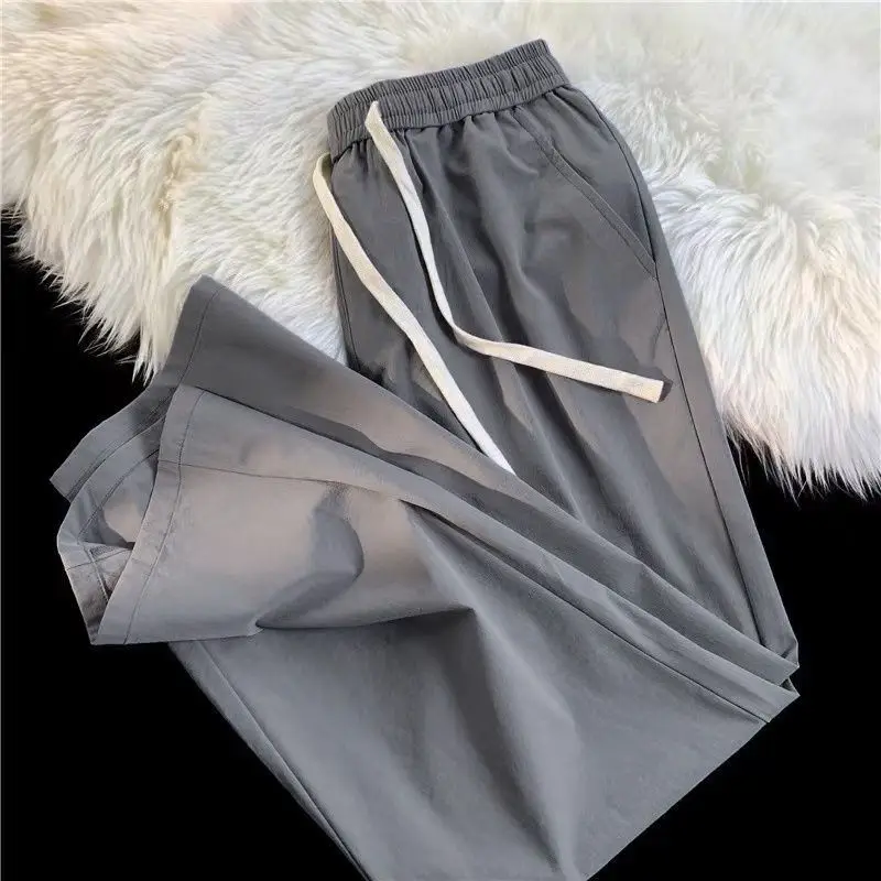 

Men's Summer Ice Silk Ultra-Thin Qui-Drng Straight Leg Casual Pants Faionable Spor Nine-Piece Pants Polyester Fiber