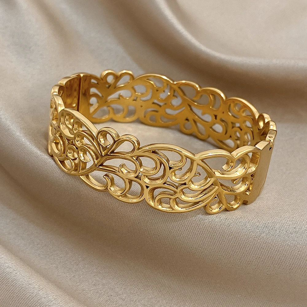 Freetry خمر الفولاذ المقاوم للصدأ الكفة واسعة سوار للنساء العصرية الذهب اللون الجوف خارج زهرة الإسورة هدايا مجوهرات مقاوم للماء