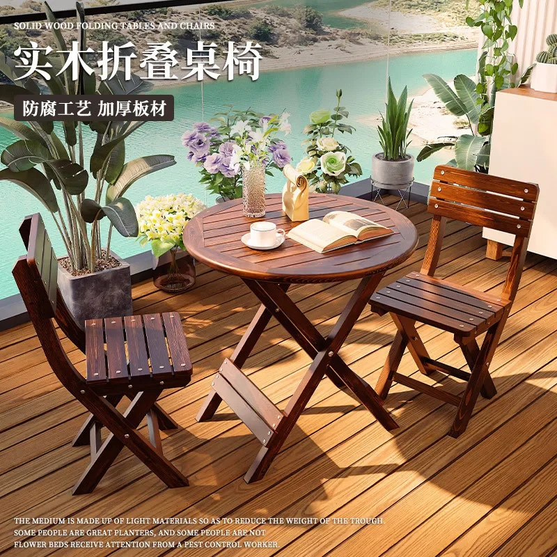 Solid wood small round table balcony table and chair combination outdoor courtyard folding table three-piece set Internet