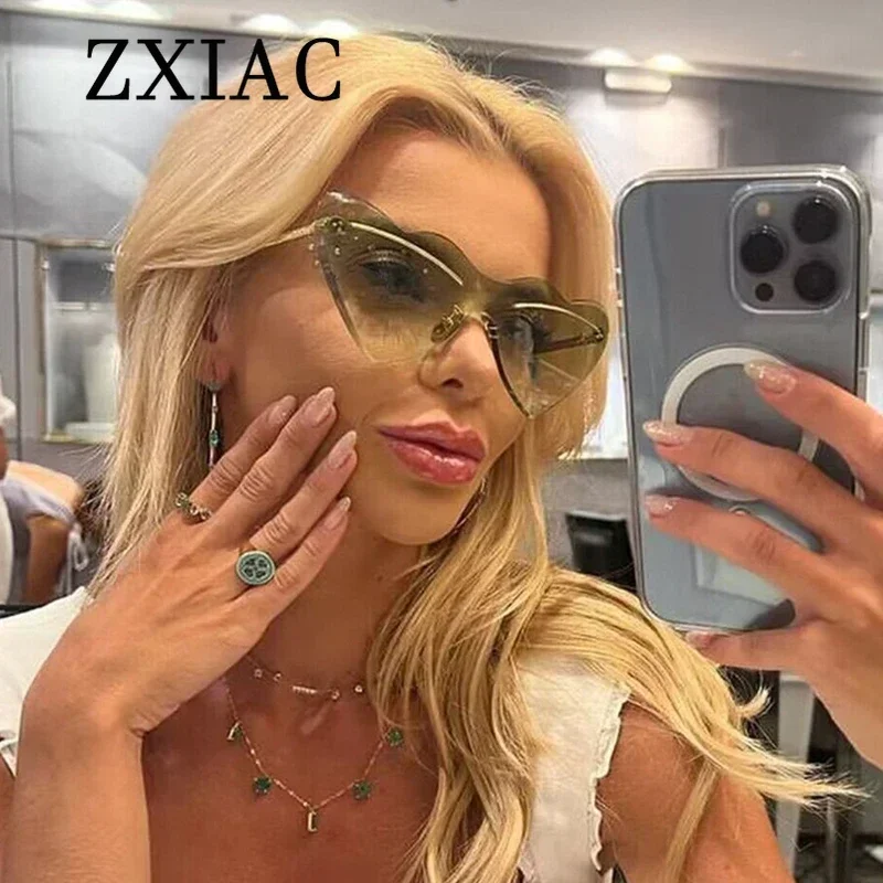 ZXIAC Fashion Heart Frameless Sunglasses Women Love Shape Rimless Sun Glasses Brand Designer Men Trendy Metal Thin Leg Shades UV